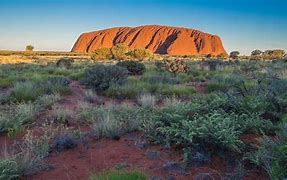 Ayers rock Australia and flat lands 