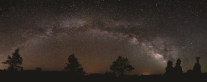 Bryce Canyon Utah Vacation 7 Milky Way stretching across a star-filled night sky above the silhouetted hoodoos and pine trees of Bryce Canyon National Park in Utah.