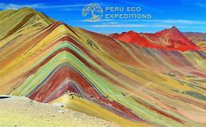 tall mountain with lots of colors