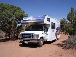 Camper at Spider Rock Canyon in the desert on a sunny day