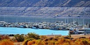 Lake Powell Marina with boats and mountains of steep cliffs