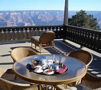 Grand Canyon Adventure: Hiking, Views, and Travel 5 Tables and chairs at a restaurant and view of the Canyon
