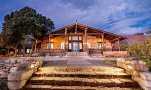 hotel at a desert at nighttime with some trees