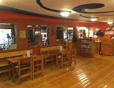 Capitol Reef National Park Guided Tours 6 tables and chairs at a restaurant