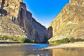 river flowing through Santa Elana Canyon Texas with steep cliffs
