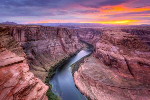 Grand Canyon steep cliffs with a river flowing through