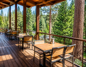 Kings Canyon, California, Camping And Hiking 4 Outdoor dining patio at John Muir Lodge in Kings Canyon National Park surrounded by towering pine trees and beautiful Sierra Nevada forest scenery.