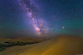 Bruneau Sand Dunes, Idaho, Camping & Hiking 8 Stars in the sky at nighttime in the desert.