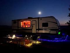 Bruneau Sand Dunes, Idaho, Camping & Hiking 7 Camper in the desert at night with campsite.