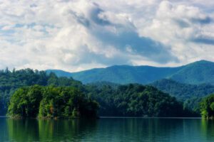 lake with forest and mountains
