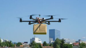 drone flying over a city and buildings