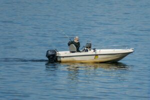 fishing from a boat on a lake