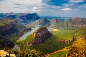 canyon with rainforest with river with steep cliffs