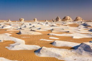 White desert in Egypt with white sand formations.