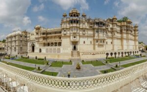 Historic palace surrounded by walls with tall towers