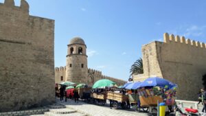 Carts carrying goods pass through the entrance gate of Sousse Medina, Tunisia