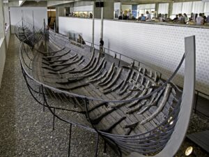 Viking Ship Remains: Windows Into the Viking Age 3 Remains of a Viking ship, partially excavated, showing wooden planks and structural details from the Viking Age.