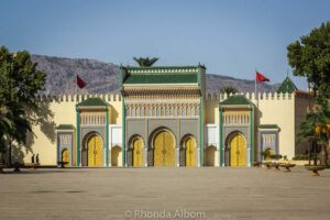 Narrow winding streets and traditional architecture in the historic Fes Medina, Morocco.