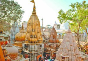 Historic temple featuring multiple pointed domes against the sky