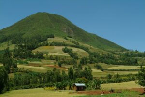 Scenic view of the Lower Valley of the Omo Heritage Site in Ethiopia, featuring rolling landscapes, the Omo River, and traditional villages.
