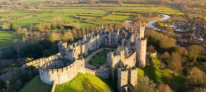 Historic castles in England, showcasing medieval architecture and scenic surroundings.