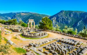 Delphi Archaeological Museum perched on a hill in Greece, overlooking the ancient ruins and valley below.”