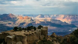 View of the Grand Canyon featuring steep, rugged walls and layered rock formations.