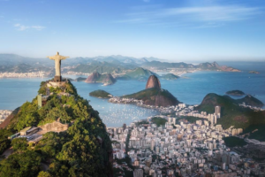 Rio’s Beaches, Coastal Trails & Outdoor Adventures 22 Christ the Redeemer atop Corcovado Mountain overlooking Rio de Janeiro, Sugarloaf Mountain, Guanabara Bay, the city, and surrounding mountains.