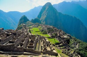 ๐๏ธ Machu Picchu Citadel: Complete Adventure & Visitor Guide 1 Panoramic view of Machu Picchu Citadel in Peru, featuring ancient Inca stone ruins, green agricultural terraces, Huayna Picchu, and surrounding Andean mountains.